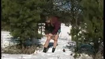 Busty girlfriend urinating on trees during winter